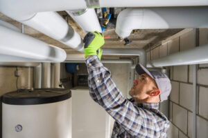 plumbing-contractor-finishing-sanitary-pipeline-installation.jpg
